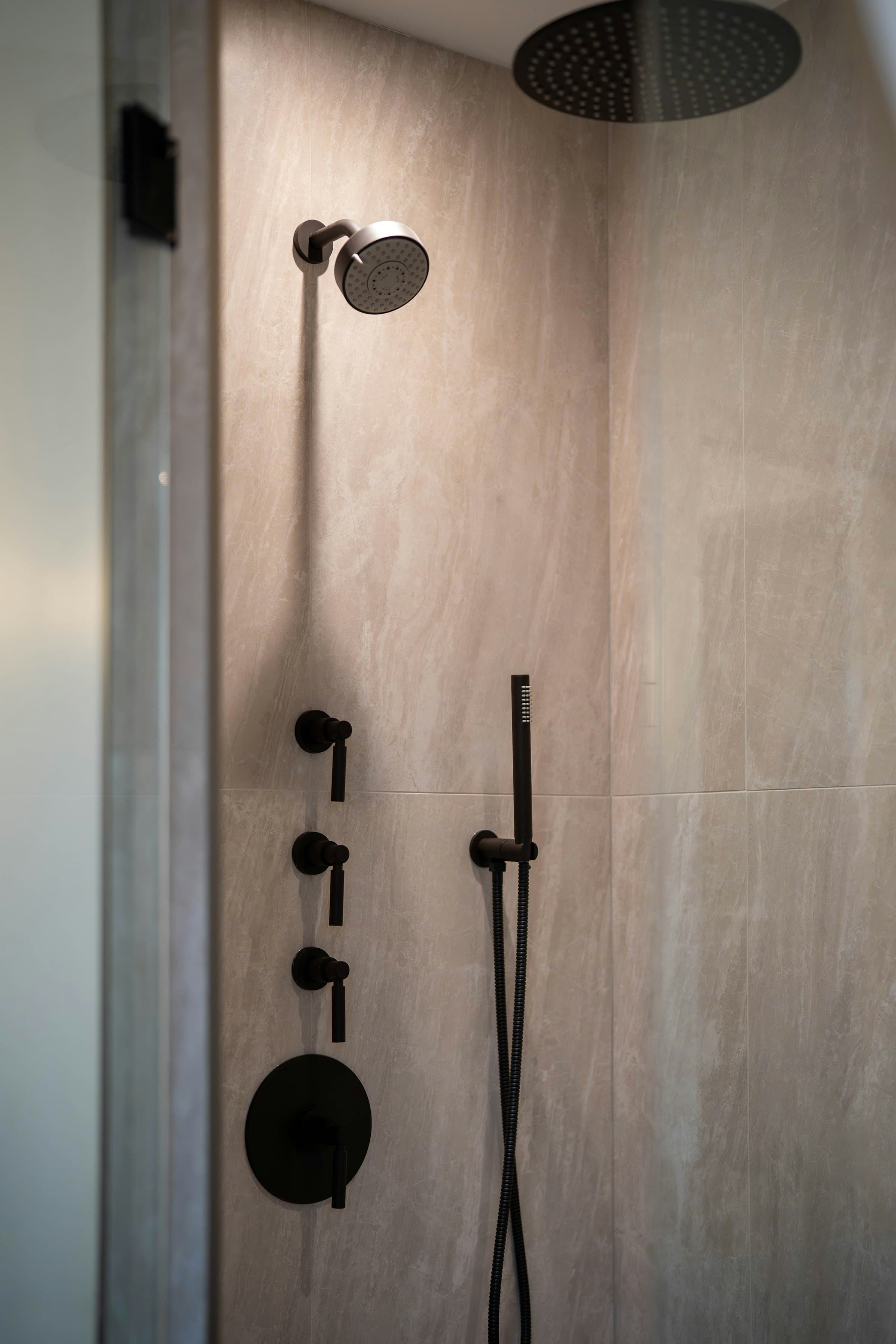 Modern shower with black rain shower head